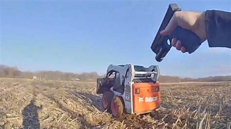 police skid steer chase bathtub|Fleeing suspect in skid loader lifts and dumps police during .